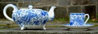 Japanese Flying Phoenix Porcelain Tea Pot with matching cup and saucer