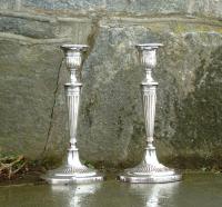 Pair Adams style Sheffield silver candlesticks