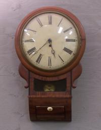 Mahogany wall clock brass movement.