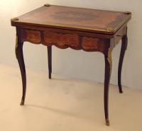 Antique French inlaid and marquetry game table