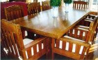 Mission oak table and ten matching chairs c1900