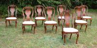 Eight Georgian l style centennial walnut dining chairs c1880