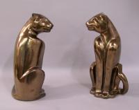 Pair of David H. Haeger pottery cougars with bronze glaze
