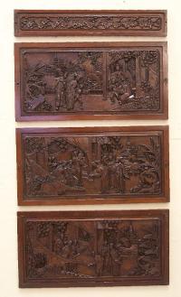 Set of four Chinese hand carved wood panels c1900