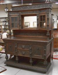 Large carved oak server with lion masks and mirror back c1885