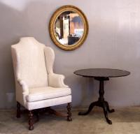 Antique Jacobean style wing chair