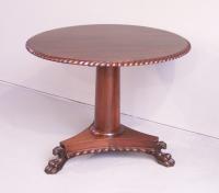 Late Federal Early Empire mahogany tilt top center table