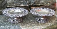 Pair of sterling silver open work table pedestals c1900