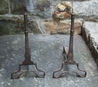 17th century iron andirons with bronze crosses c1680