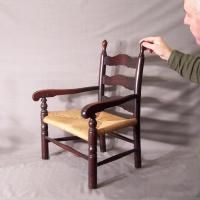 Childs solid mahogany ladder back arm chair c1900