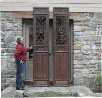 Pair of Chinese hand carved wood temple doors c1700