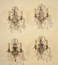 Set of four Regency style two light wall sconces with mirrors