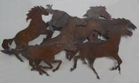 Galloping horses wall sculpture