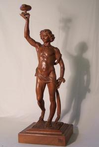 Late Renaissance walnut sculpture of a young man
