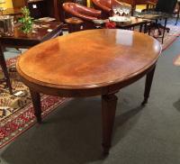 Antique English oval walnut dining table with satin wood inlay c1870