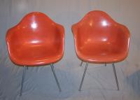 Pair orange Mid Century Modern Herman Miller armchairs