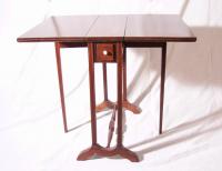 Antique diminutive mahogany swing leg table c1890