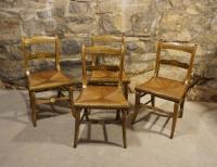 Set of four hand painted Empire chairs with rush seats c1825
