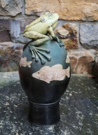 Artisan ceramic frog and fish garden sculpture