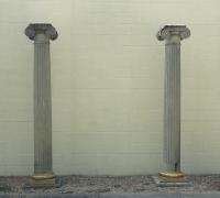 Pair of large Doric style architectural fluted columns