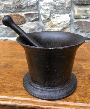 Image of Early American cast iron mortar and pestle