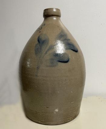 Image of J Fisher Co Lyons NY stoneware jug with tulip