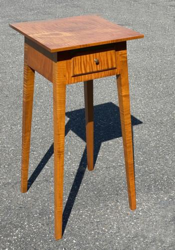 Image of Eldred Wheeler tiger maple splay leg stand with drawer